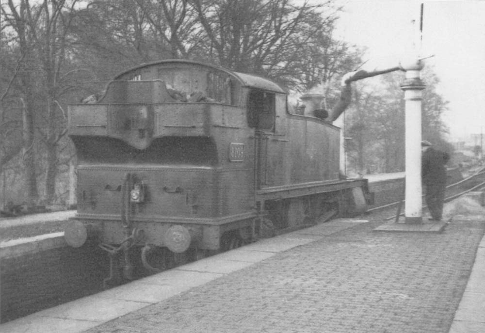 Ex-GWR 81xx Class 2-6-2T No 8109 is seen being topped up with water whilst acting as banker in 1960