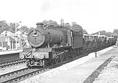 Ex-GWR 49xx Class 4-6-0 No 5983 'Henley Hall' passes through with a down Class H goods service on 8th June 1963
