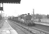 Ex-GWR 4073 Class 4-6-0 No 5031 'Totnes Castle' passes through with a Class C XP working on 5th October 1963