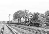 BR built 4073 Class 4-6-0 No 7011 'Banbury Castle' passes Budbrook with a Shrewsbury to Paddington parcels train