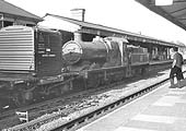 Ex-GWR 2251 Class 0-6-0 No 2210 runs tender first through Warwick on an up goods service on 8th June 1963