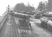 Close up showing a train of four-wheel petrol tank cars being marshalled for the Regent Oil Company