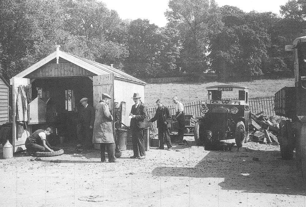Temporary garage facilities erected for Warwick Royal Show with Fordson tractor No 2313 under repair