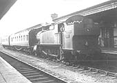 GWR 2-6-2T large prairie No 3163 with two ganged brake composite corridor coaches on an up local passenger train