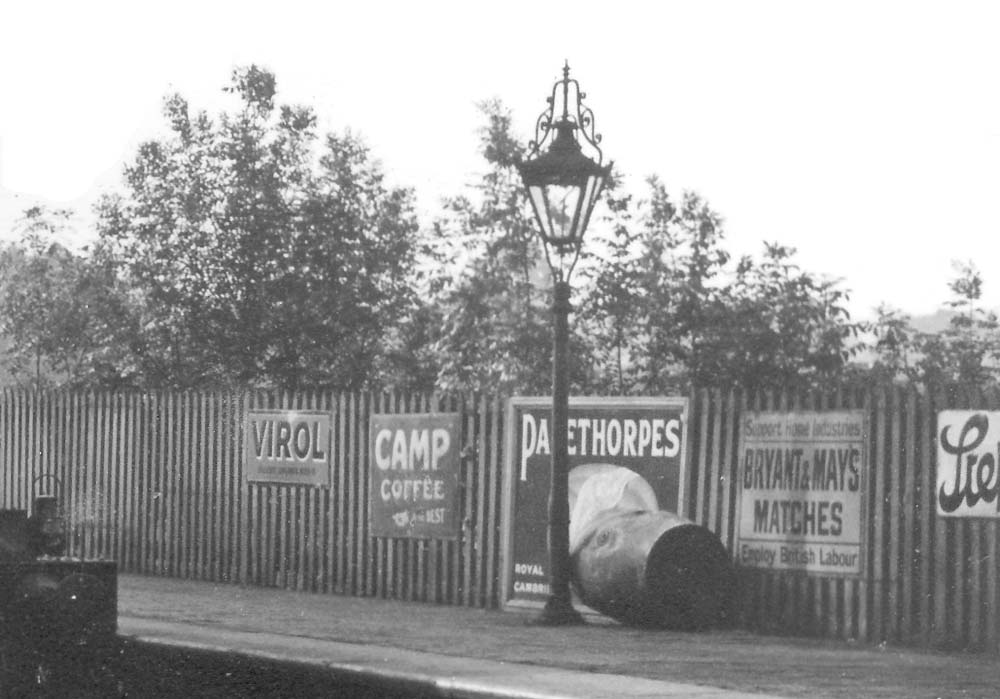 Close up showing one of Warwick station's several ornate gas lampposts situated on the up platform