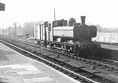 Ex-GWR 0-6-0PT 57xx class Pannier Tank No 3624 glides through the station on the up line with a single van in tow