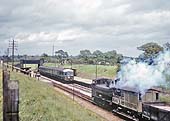 British Railways built 57xx Class 0-6-0PT No 9682 is seen in charge of a pick-up freight from Stratford upon Avon