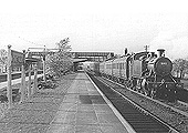 GWR 2-6-2T Large Prairie No 5192 is seen at the head of a long down local passenger train standing at the slow platform