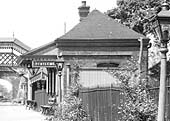 Close up showing the Stratford upon Avon end of Wilmcote station's down platform passenger building with the gentlemen's toilet in the gable end