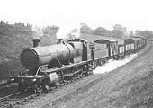 GWR 2-8-0 28xx class No 2829 is seen approaching Wood End on a northbound goods train