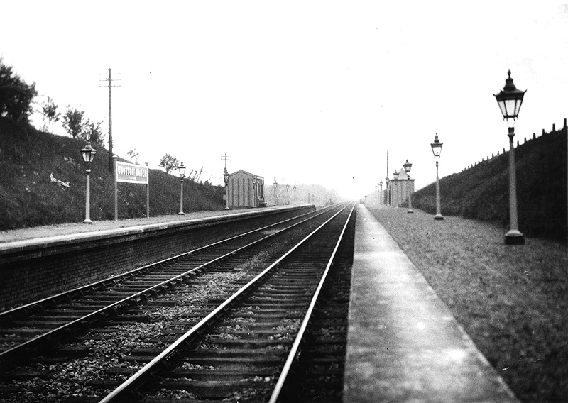 Looking towards Birmingham showing the replacement GWR Pagoda building on the down platform and the bridge which carries the line over Wawensmere Road