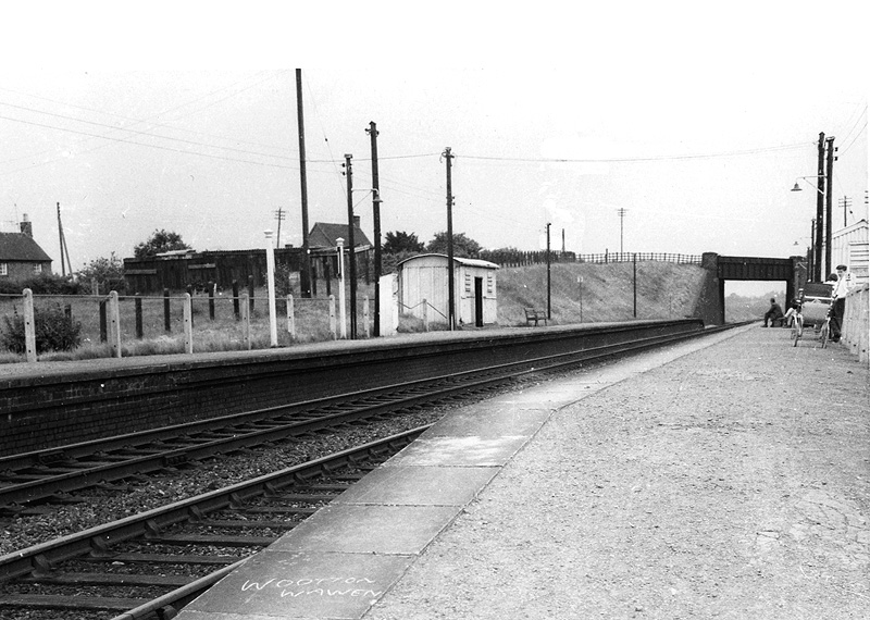 Looking towards Stratford upon Avon circa 1960 showing the fencing on the left marking the footpath to the down platform circa 1960s
