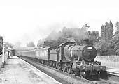 Ex-GWR 2-6-0 43xx Class No 5306 passes through Yardley Wood on a down empty stock working in August 1959