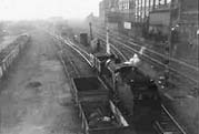 Ex-LMS 2P 4-4-0 No 40690 is seen shunting wagons on the loop line into Adderley Park sidings