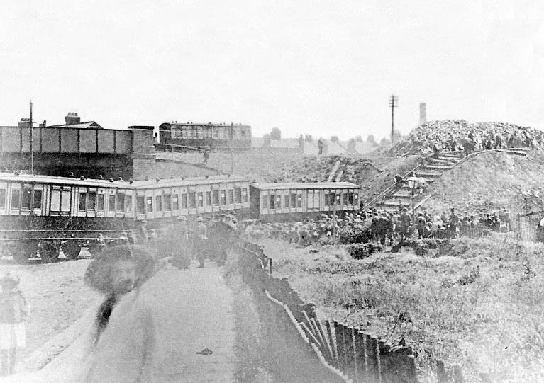 Looking down Broomfield Road with three of the remaining carriages still standing across the junction with Albany Road