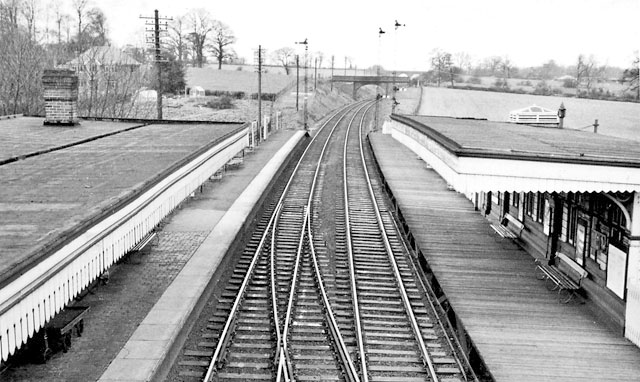 Looking towards Birmingham from the passenger footbridge showing the two sets of signals on the right