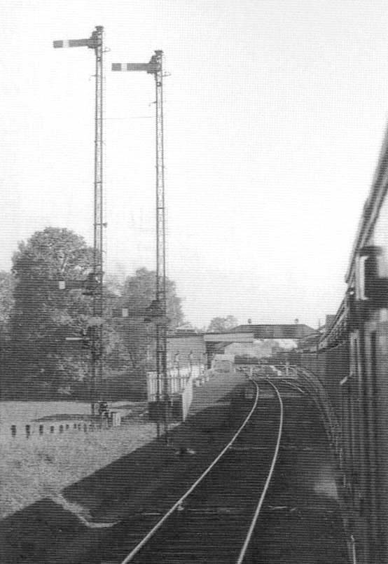 Berkswell Station's up home signals, the one on the left for Tile Hill and the one on the right for Kenilworth Junction seen on 2nd October 1961