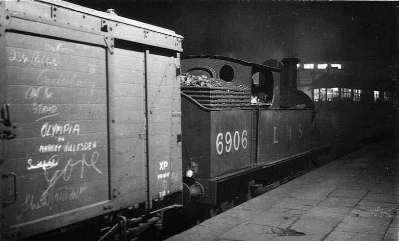 Ex-LNWR 2P 0-6-2T 'Watford Tank' No 6906 is seen on pilot duties at the West end of Platform 1 coupled to a 10 ton Van on 28th January 1950