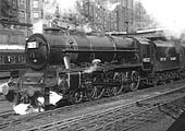 Ex-LMS 6P 4-6-0 No 45532 'Illustrious' in 1946 LMS black lined livery stands at Platform 5 on a Wolverhampton express