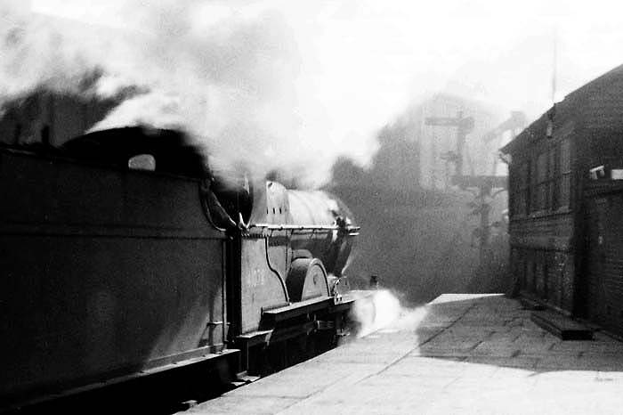 An unidentified ex-LMS 4P 4-4-0 Compound locomotive is seen standing at the East end of Platform 8 alongside No 2 Signal Cabin