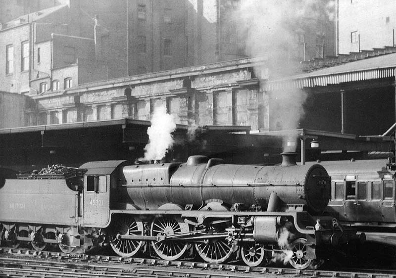 Ex-LMS 5XP 4-6-0 Jubilee class No 45721 'Impregnable' is seen raising steam ready to take forward an up express to Euston