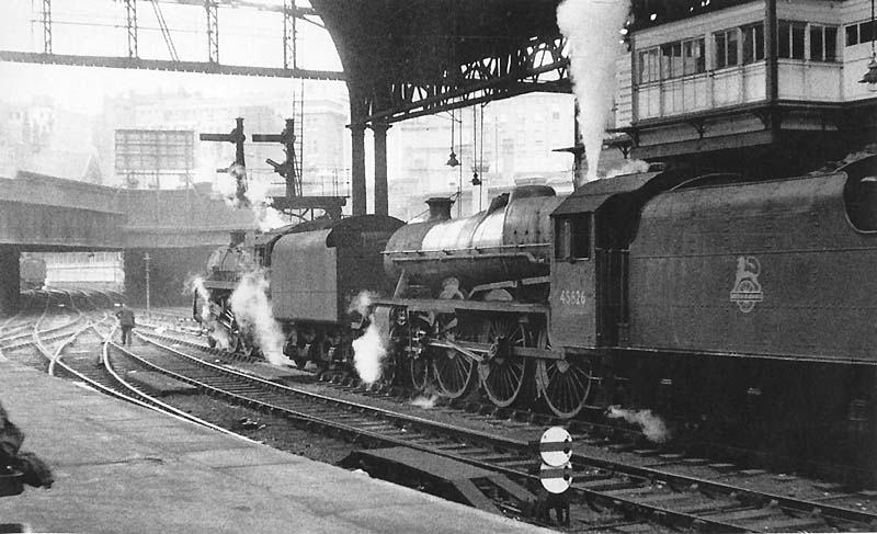 British Railways Class 5 4-6-0 No 73141 is piloting ex-LMS 5XP 4-6-0 No 45626 'Seychelles' on a heavy Bristol bound express circa 1958