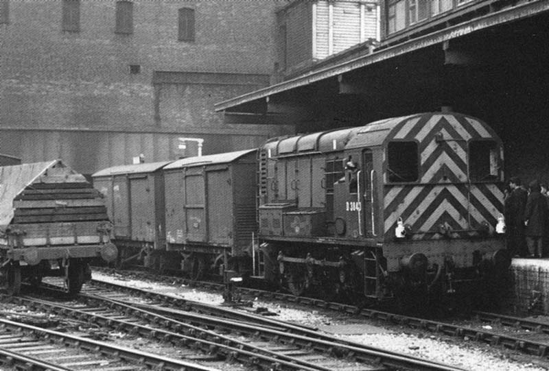 British Railways built 'Black 5' 4-6-0 No 44685 stands at the East end of Platform 3 with a New Street to Euston express passenger service
