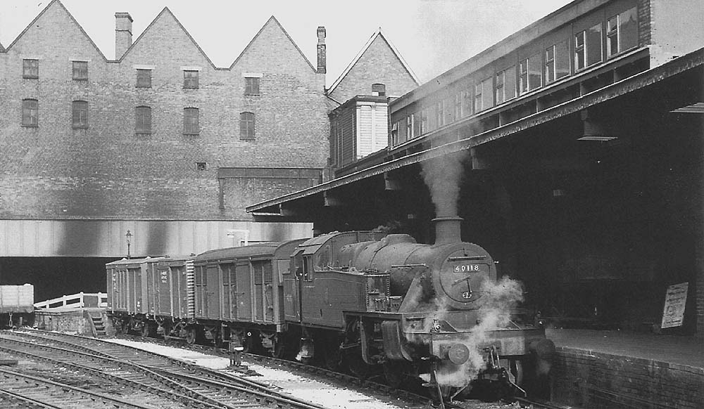 Ex-LMS 3P 2-6-2T No 40118 is seen acting as station pilot on the old LNWR portion of New Street and is marshalling vans