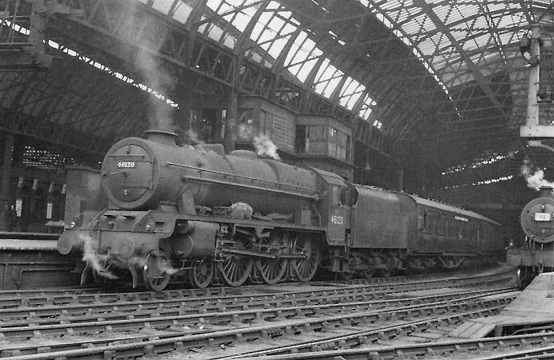 Ex-LMS 6P 4-6-0 Rebuilt Royal Scot class No 46120 'Royal Inniskilling Fusileer' stands at Platform 9 with a named service to Bristol