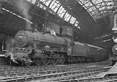 Ex-LMS 6P 4-6-0 Rebuilt Royal Scot class No 46120 'Royal Inniskilling Fusileer' stands at Platform 9 with a named service to Bristol