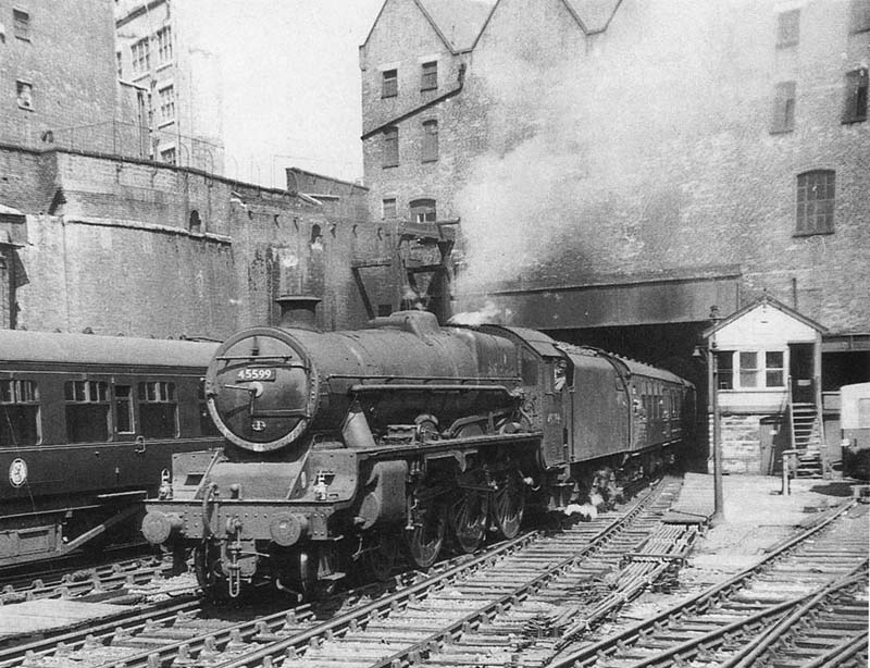 Ex-LMS 5XP 4-6-0 Jubilee class No 45599 'Bechaunaland' at the head of a down express is seen passing No 1 Signal Cabin as it enters New Street station