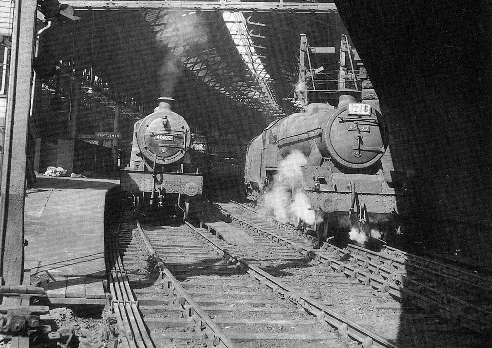 Ex-LMS 4P 4-4-0 Compound No 40932 and ex-LMS 5XP 4-6-0 Jubilee class No 45599 are standing at Platforms 7 and 8 adjacent to Queens Drive bridge