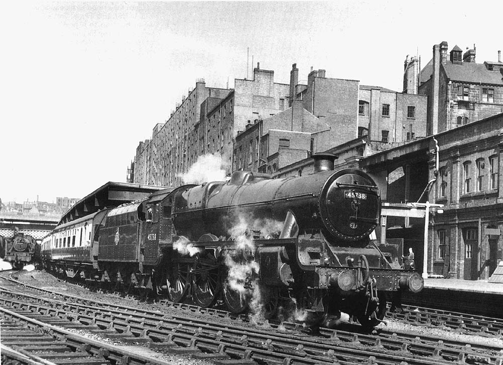 Ex-LMS 5XP 4-6-0 Jubilee class No 45738 'Samson' newly resplendent in Brunswick Green departs Platform 1 with an up express to Euston
