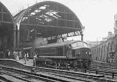 British Railways Type 4 1-Co-Co1 D94 is seen standing at Platform 9 ready to depart with the 12 52pm York to Bristol express on 8th June 1961