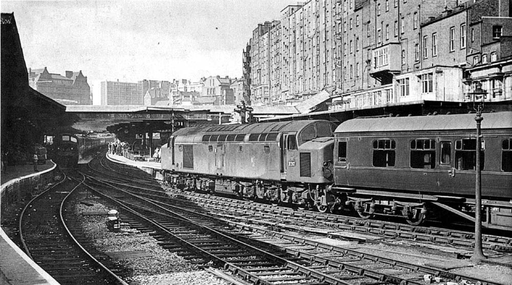 British Railways Type 4 1Co-Co1 D267 is seen arriving at Platform 5 with empty stock to form the 12:10pm to Blackpool Central on a Sunday in 1964