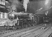 Ex-LMS 5XP Jubilee class No 45649 'Hawkins' is seen standing at the West end of Platform 9 with the 6 37pm service to Worcester