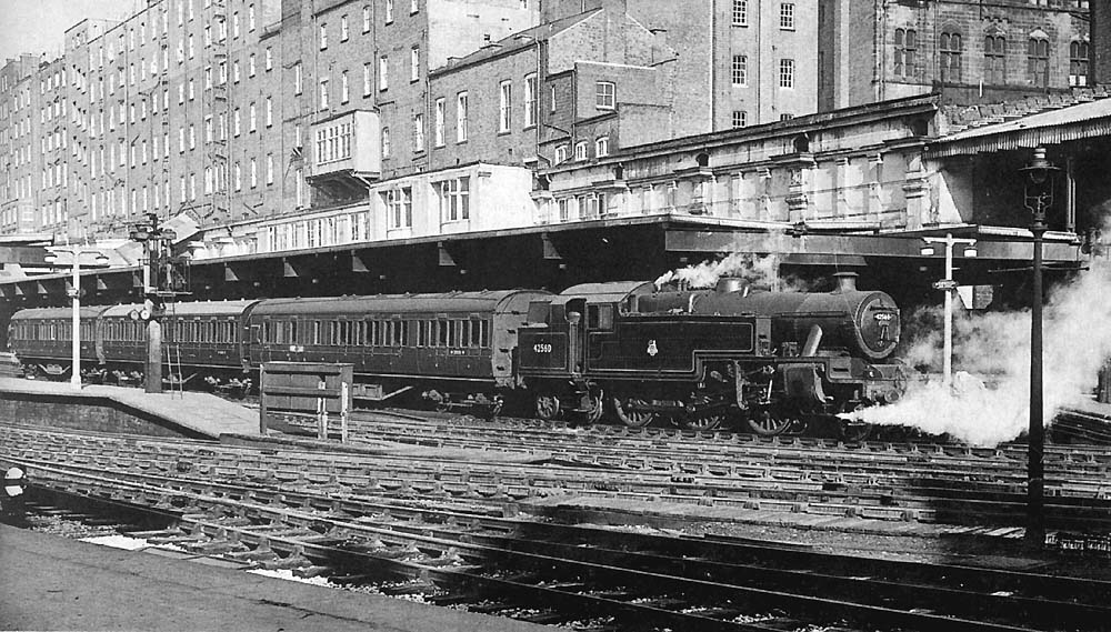 Ex-LMS 4MT 2-6-4T No 42560 is seen standing at Platform 3 after arriving on the 7:17am Rugeley to New Street service on 5th April 1958