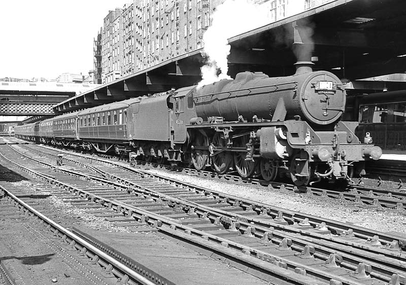 Ex-LMS 5MT 4-6-0 No 45286 stands at platform 3 at the head of an up express to Euston on 27th July 1963