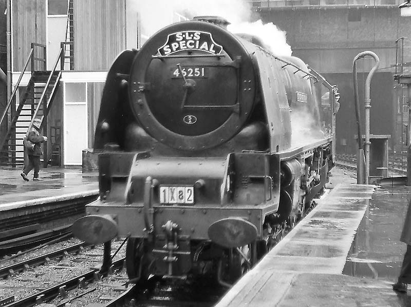 Ex-LMS 8P 4-6-2 No 46251 'City of Nottingham' arrives light engine at New Street station on 12th July 1964