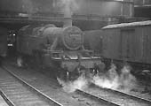 Ex-LMS 3P 2-6-2T No 40129 is seen wreathed in steam as it pauses between pilot duties at New Street station