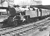 BR built 4MT 2-6-4T No 42112 is seen standing at the head of a down express on 22nd June 1963