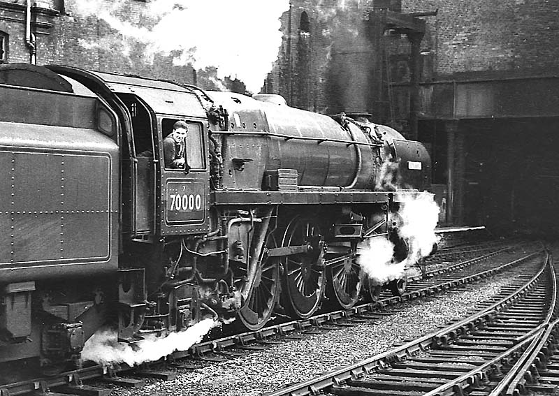 British Railways Standard Class 7MT 4-6-2 No 70000 'Britannia' departs New Street station on an up express on 22nd June 1963