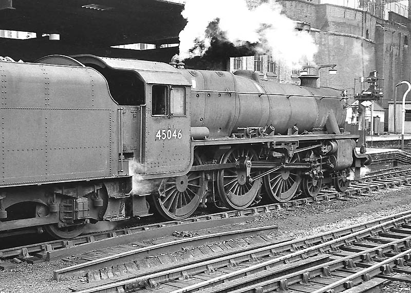 Ex-LMS 5MT 4-6-0 No 45046 is seen at platform 3 with steam escaping from its safety valves on 13th July 1963