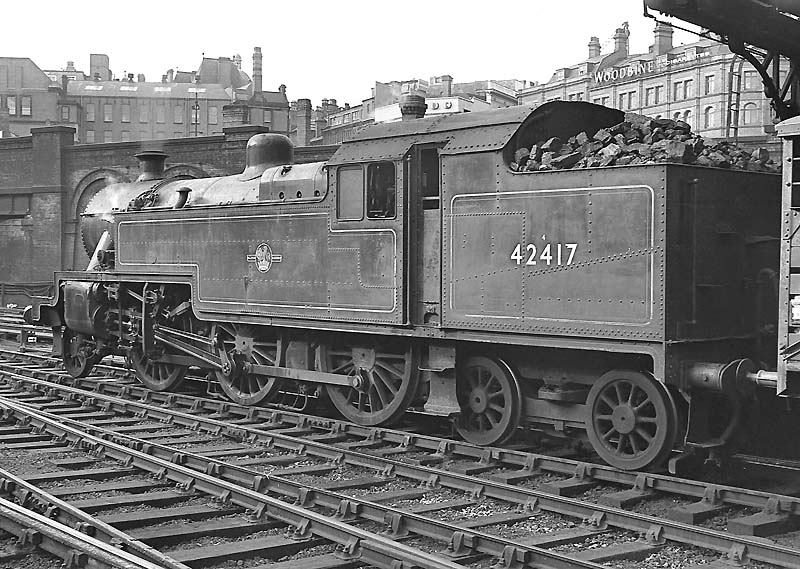 Ex-LMS 4P 2-6-4T No 42417 is seen within the Midland portion at New Street station with a cattle wagon behind the bunker on 14th September 1962