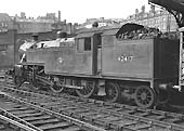Ex-LMS 4P 2-6-4T No 42417 within the Midland portion of New Street station with a cattle wagon behind the bunker
