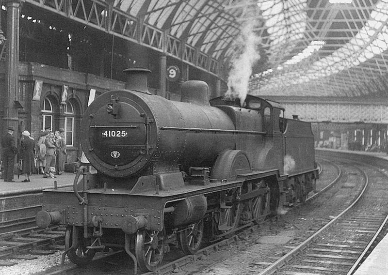 Ex-Midland Railway 4P 4-4-0 No 41025 stands on the centre road between platforms 9 and 10 on 6th September 1952