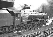 Ex-LMS 8P Coronation Class 4-6-2 No 46245 'City of London' departs platform 3 with an up express service to Euston on 22nd August 1963