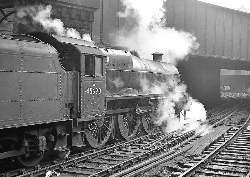Ex-LMS 5XP 4-6-0 No 45690 'Leander' departs from platform 7 with an up express on 20th September 1963