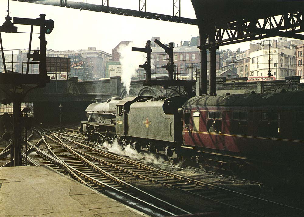 Ex-LMS 5XP 4-6-0 Jubilee class No 45579 'Punjab' is seen starting away from Platform 9 on a semi-fast express train to Gloucester