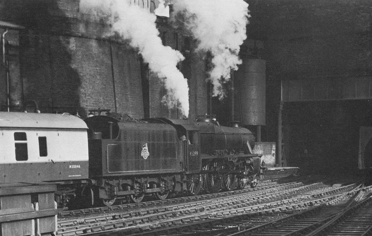 Ex-LMS 5MT 4-6-0 No 45299 is seen disappearing into Worcester Street tunnel at the head of empty coaching stock off a Manchester to Birmingham express